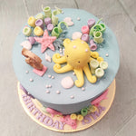 Let’s go on a magical adventure to the seaside with this sea animals cake. Where art meets pastry in a delightful marine theme is where our sea creature cake ideas are brought to life. With this sea creature birthday cake for kids, we hope to transport you and your taste buds into a magical world under the sea.