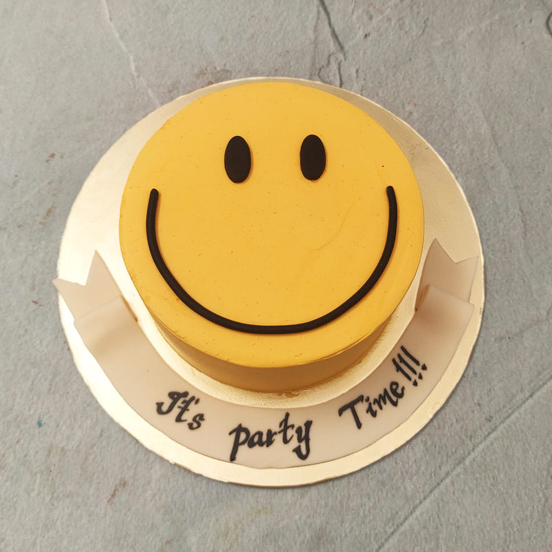 Like the banner near the smiley birthday cake for kids says, “It’s party time!!!” and we’ve come prepared. If you’ve been struggling to come up with designs or ideas for your someone special’s special day, this smiley theme cake is the safest and most fun design you could go with as a design for a birthday cake for him / birthday cake for her.