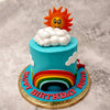 Here comes the Sun theme cake! This sun and rainbow cake is sure to brighten up your day and maybe even add a little colour to it