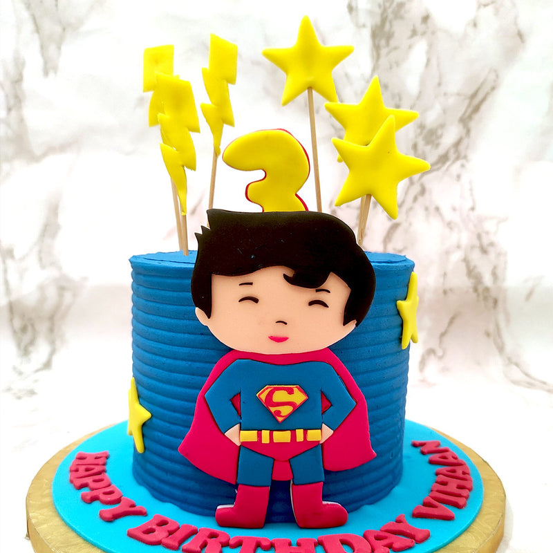 Thematic, artistic and playful, we've carefully crafted the elements of this Superman cake design around everything a birthday cake for kids can and should be. 