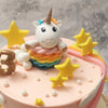  A light pink shade forms the base of this pastel rainbow unicorn cake that is draped in a 3D rainbow from one corner to the other. Yellow stars, fluffy white clouds and lustrous, planet-like pearls embellish this rainbow unicorn birthday cake for kids all over to add to the celestial theme we've centered this piece around.
