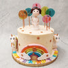 A neutral toned, star-studded beige base forms the backdrop to which the beautiful colours and magical elements on this unicorn and rainbow cake get highlighted. Resting in the centre is the beautiful arc of 7 colours, your very own star-studded, edible rainbow. 