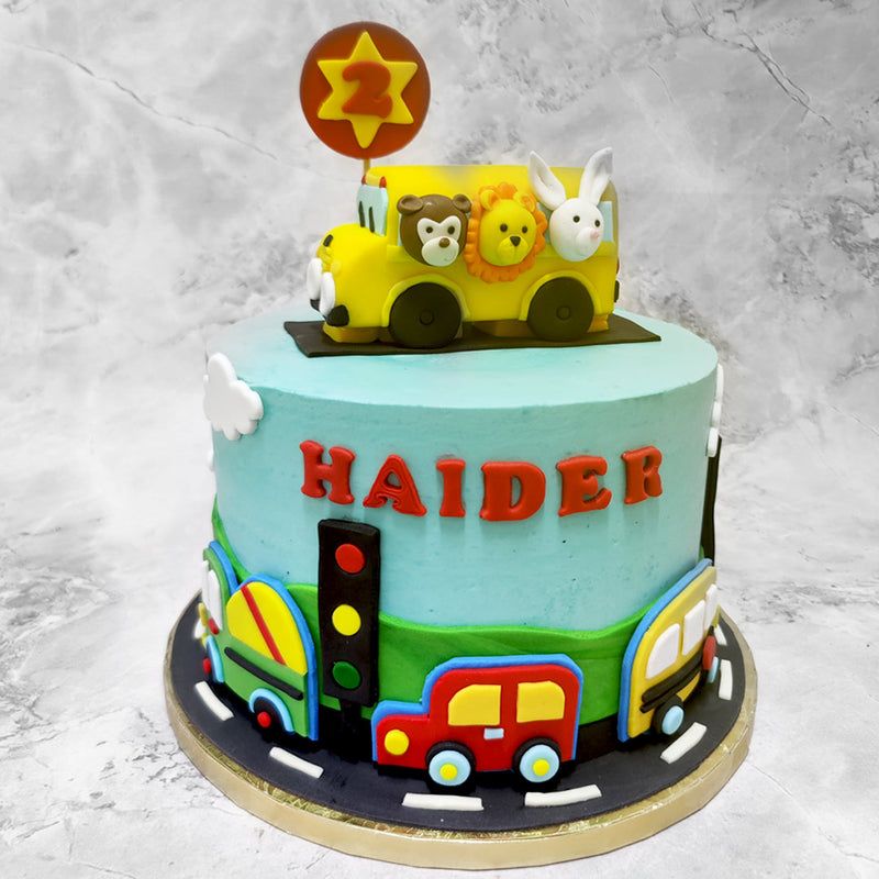 Children are inquisitive creatures and what's more attention grabbing for a curious child than colourful buses? This wheels on the bus cake brings out the child in all of us, through its vibrant and urban appearance. 