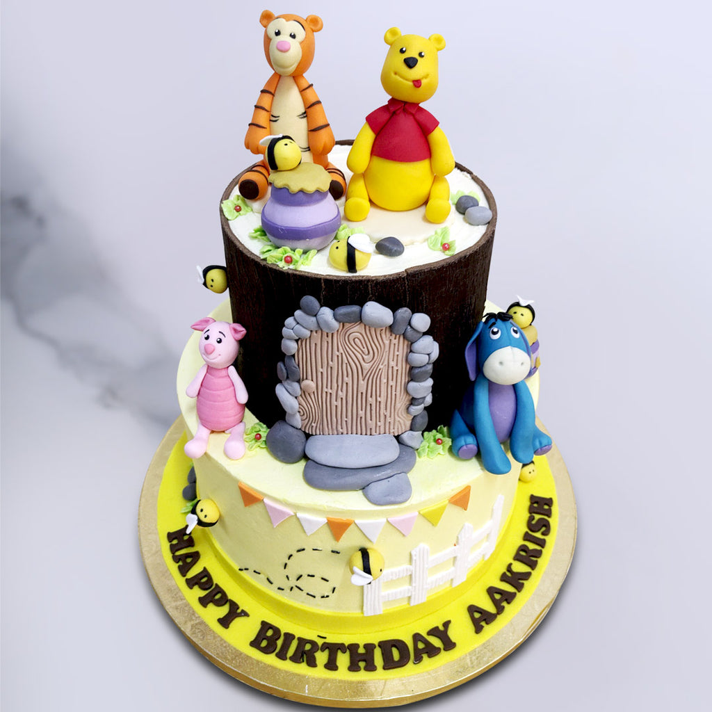 Take a trip down memory lane with this special Winnie the Pooh cake which brings to life all our favourite childhood characters. This Winnie the 2 tier Pooh cake is double the trouble with twice the tiers, twice the nostalgia and twice the flavour.