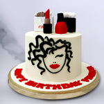 Even though this woman face cake is the gift that keeps on giving in regards to cakes for her, there are also two gift bags proudly displayed on top, with one being from Nykaa along with a red lipstick (matching the portrait in the cake) and red nail polish too. We've even recreated the paper stuffed inside it to add more to the detailing on this silhouette lady face cake design. 